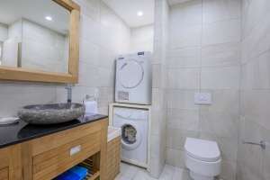 bathroom with washer and dryer