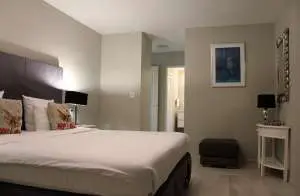 Luxury 2 bedroom Seafront Villa, Coral Garden, by Curacao Luxury Holiday Rentals, located in the Curacao Ocean Resort