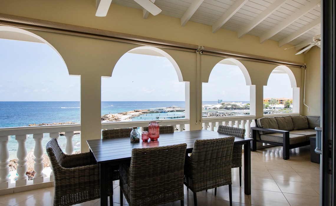 sea front terrace at marvelous three bedroom penthouse apartment named Dolphin Paradise by Curacao Luxury Holiday Rentals