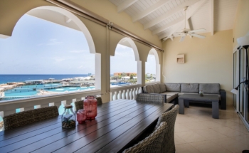 sea front terrace at marvelous three bedroom penthouse apartment named Dolphin Paradise by Curacao Luxury Holiday Rentals