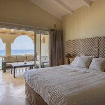 master bedroom with sea view in the marvelous three bedroom penthouse apartment named Dolphin Paradise by Curacao Luxury Holiday Rentals