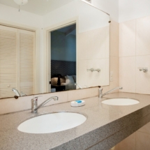 ensuite bathroom with double sink in the marvelous three bedroom penthouse apartment named Dolphin Paradise by Curacao Luxury Holiday Rentals