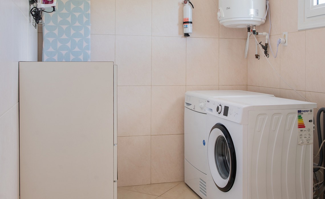washer dryer in the marvelous three bedroom penthouse apartment named Dolphin Paradise by Curacao Luxury Holiday Rentals