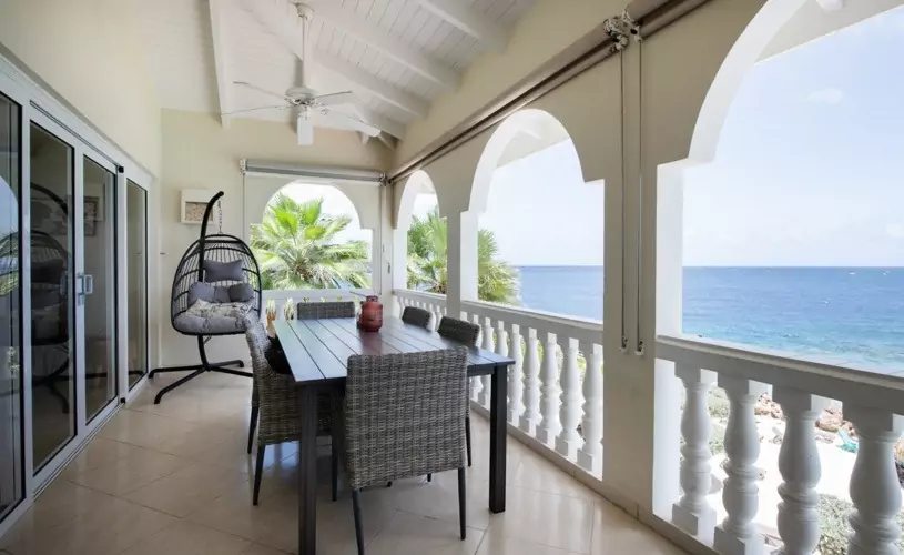 sea front terrace at marvelous three bedroom penthouse apartment named Dolphin Paradise by Curacao Luxury Holiday Rentals